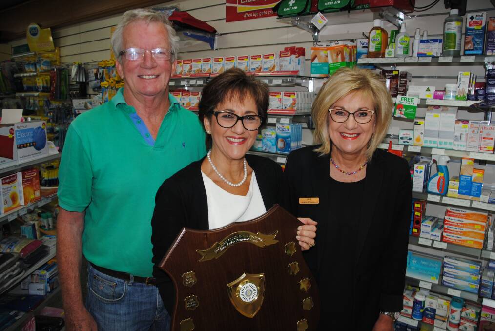 WINNER: Longford Rotary Club's Linus Grant with Longford Pharmacy's Jenny Meyer and Jane Goss, who were recognised with the 2016 business of the year Are You Being Served? award.
 