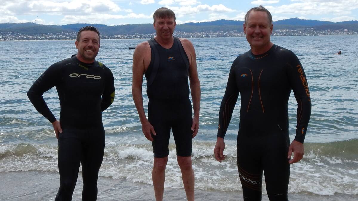 PREPARED: Ben Carpenter, Pat Fitzgerald and Ian Johnstone will take on Western Australia's Rottnest Channel on Saturday. They swam about 16 kilometres from Swanwick to Swansea to prepare. Picture: supplied.