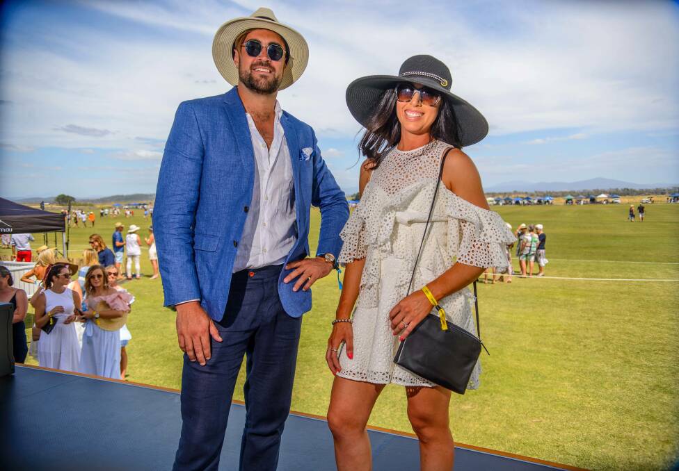 WINNERS: John O’Riordan, of Brisbane, and Bek Tyler, of Quamby Brook, won the polo's first fashions on the field event. Picture: Scott Gelston