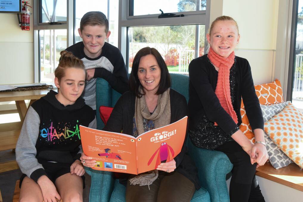 STORY TIME: Love Your Library Challenge prepares Ollie Cross, 12, Jack Harris, 12, Sophie Flanagan and Ava Harris, 10, for the Stories Festival. 