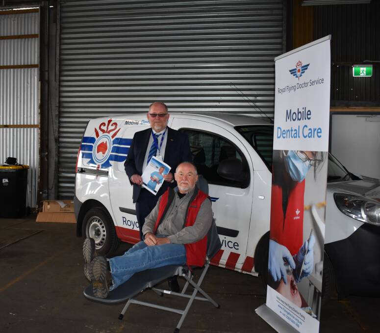 GIVER: The Royal Flying Doctor Service's Tasmanian chief executive John Kirwan with Tasmanian Craft Fair director Tim Biggs, checking out the organisation's mobile care unit. Funds from this year's fair will be donated to the charity. 