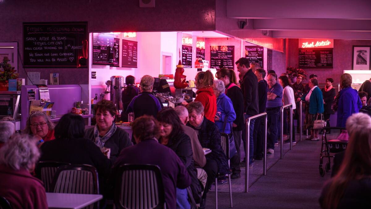 PACKED HOUSE: Fitzies City Cafe is preparing to close for the final time, but fans of the cafe don't want to miss their last chance for scones, jam and cream. The cafe will close at 4pm on Friday. Picture: Scott Gelston