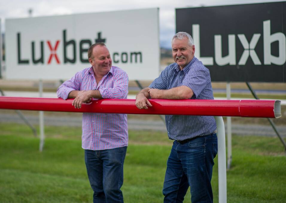 READY: The Tasmanian Turf Club's Brian Walker and Peter Scott inspect the track before Wednesday's Launceston Cup. The main event at the Cup will be run at 4.17pm. Picture: Scott Gelston.