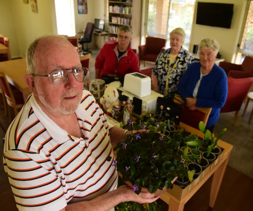 SALE: Ephinwood Villa residents Michael Clarke, Elaine Hamilton, Val Thomas and Maureen Potts have been preparing for their annual garage sale. Picture: Paul Scambler