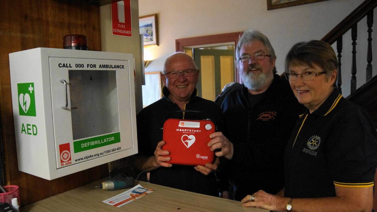 RECEIVERS: Deloraine Rotary Club president Bill Muldoon, Mole Creek Hotel licensee Doug Westbrook, and Lesley Dare, community service director for the Rotary club. Picture: supplied.