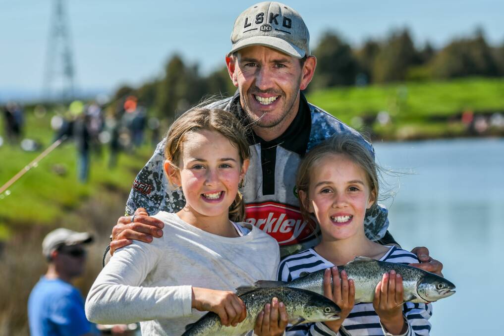 HERE FISHY: Corey Maney of Longford, with Ella and Ciara caught a few fish early in the day at National Gone Fishing Day.