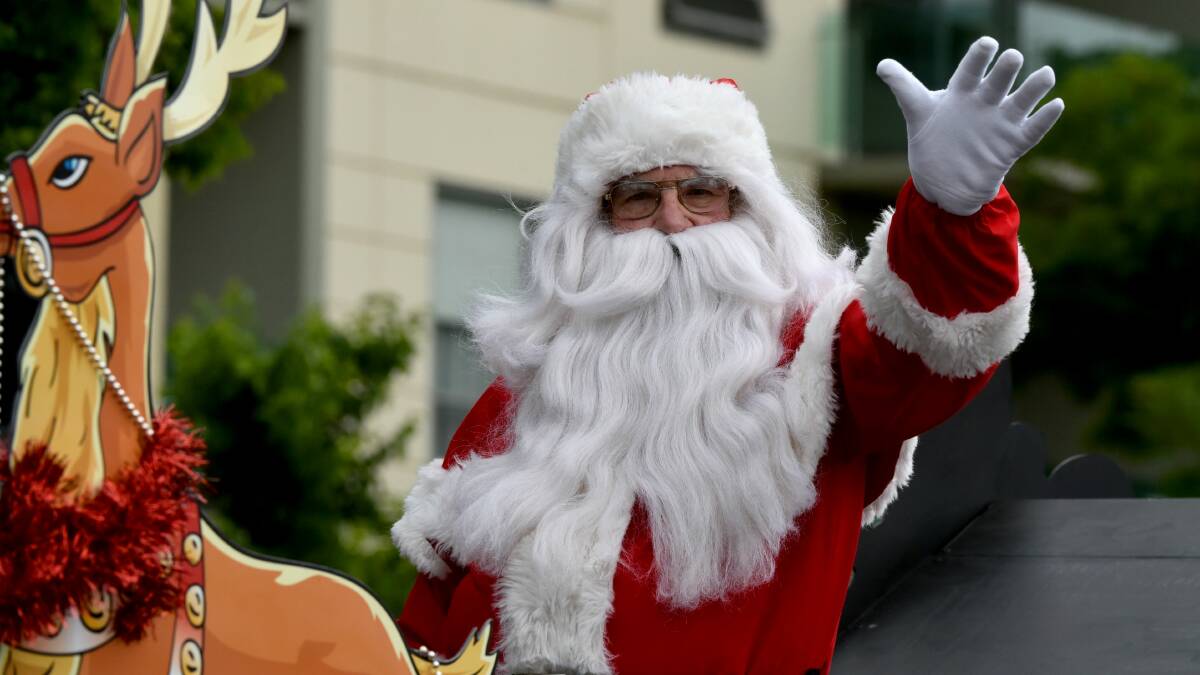 CROWD FAVOURITE: Santa closed the 2016 Apex Launceston Christmas Parade. It is estimated 10,000 people lined the streets to watch the 37 floats. Pictures: Neil Richardson