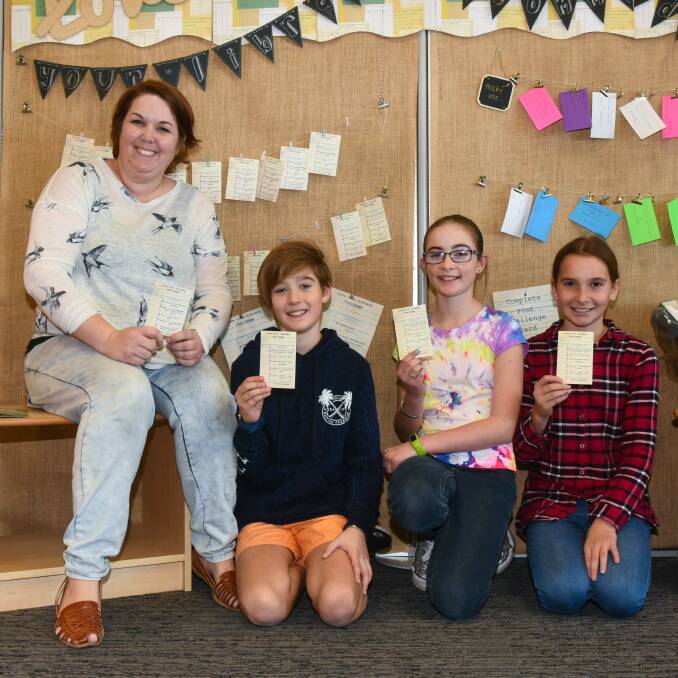 READY: Trudi and Eliott Cross, 10, with Jenna Long, 12, and Lily Andjelkovic, 12, preparing for Stories Festival launch on Thursday. Pictures: Neil Richardson