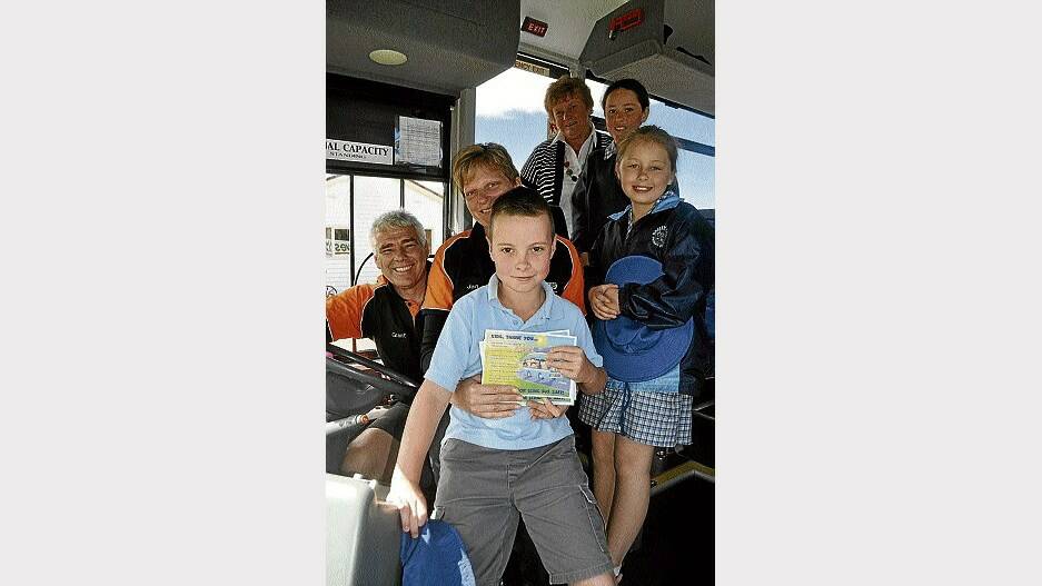 Taking part in the bus safety initiative are (from left) Westbus directors Grant and Jan Bingley, Hagley Farm Primary School pupil Will Culter, 10, Meander Valley councillor Pat Frost and pupils Brooke Hanham and Sophie Badcock, 10.