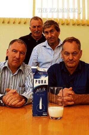 Dairy farmers Richard Bovill and David Bloomfield, of Mersey Valley, John Jones, of Hamilton, and Phil Beattie, of Styx River dairy farm at Bushy Park. The disgruntled farmers are disappointed that the milk pricing issue was not resolved after nine hours of negotiations on Thursday with National Foods. Picture: PAUL SCAMBLER