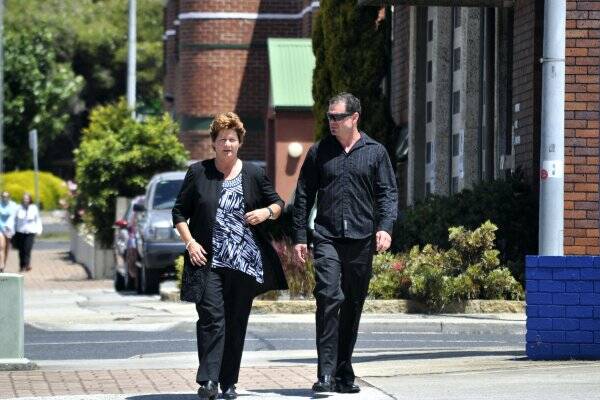 Adam Taylor with his mother in Burnie after giving evidence yesterday.