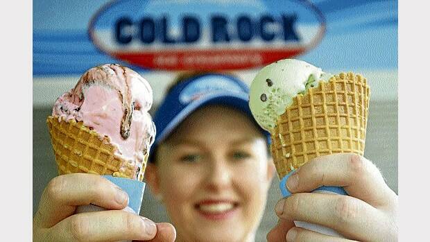 Cold Rock Ice Creamery manager Katelyn Rossiter samples the selection before today's opening.