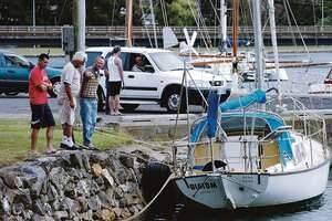 The yacht moored in the Leven River yesterday where a man drowned doing maintenance. Picture: PETER LORD