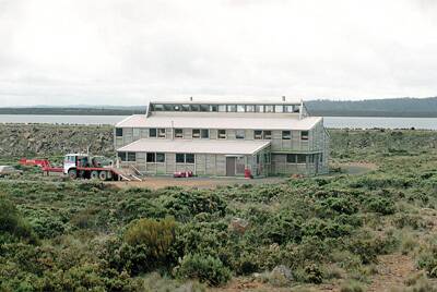 BERNACCHI  LODGE WHERE: Lake  Augusta, Central Highlands.  COST: Built in  1980 for $425,000. Now  valued at more than  $750,000. DEMOLITION:  To take four  weeks, costing $50,000.  NOW  WRECKING