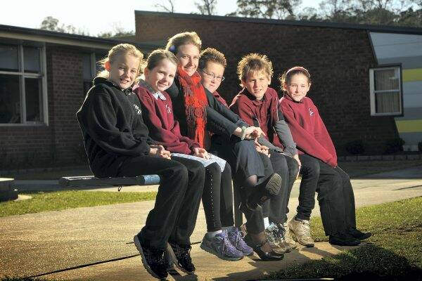 Ravenswood Heights Primary School pupils Tahlia Donoghue, 10, Jenaya Cannon, 8, new principal Britany Roestenburg and pupils Harley Langley, 10, Tarkyn Coppleman, 10, and Jacinta Close, 9.  Picture: SCOTT GELSTON