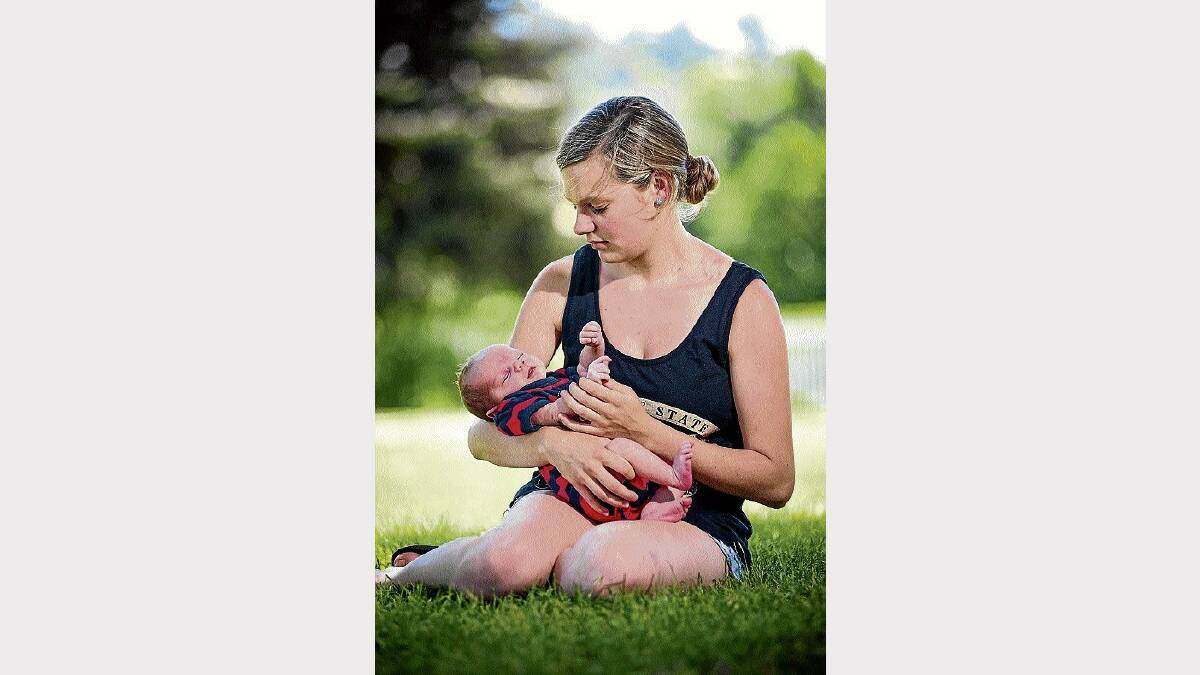 Four-week-old Oliver Zachary Macloud with his mother, Bec Aitchison, of Riverside. Oliver is the most popular boys' name for 2013. Picture: PHILLIP BIGGS