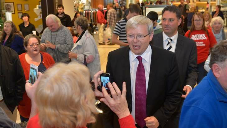 There are cameras everywhere as Kevin Rudd, celebrity MP, gets something of a hero's welcome at the Corio Shopping Centre on his tour of Geelong. Photo: Michael Clayton-Jones