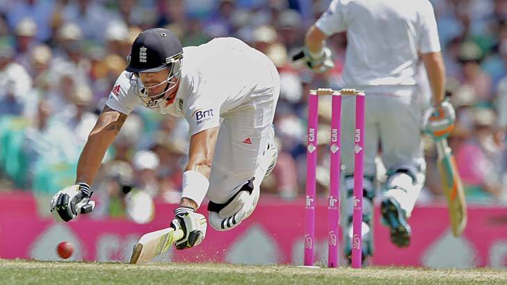 Desperate times ... Kevin Pietersen makes a dive for the crease on day two. Photo: Brendan Esposito