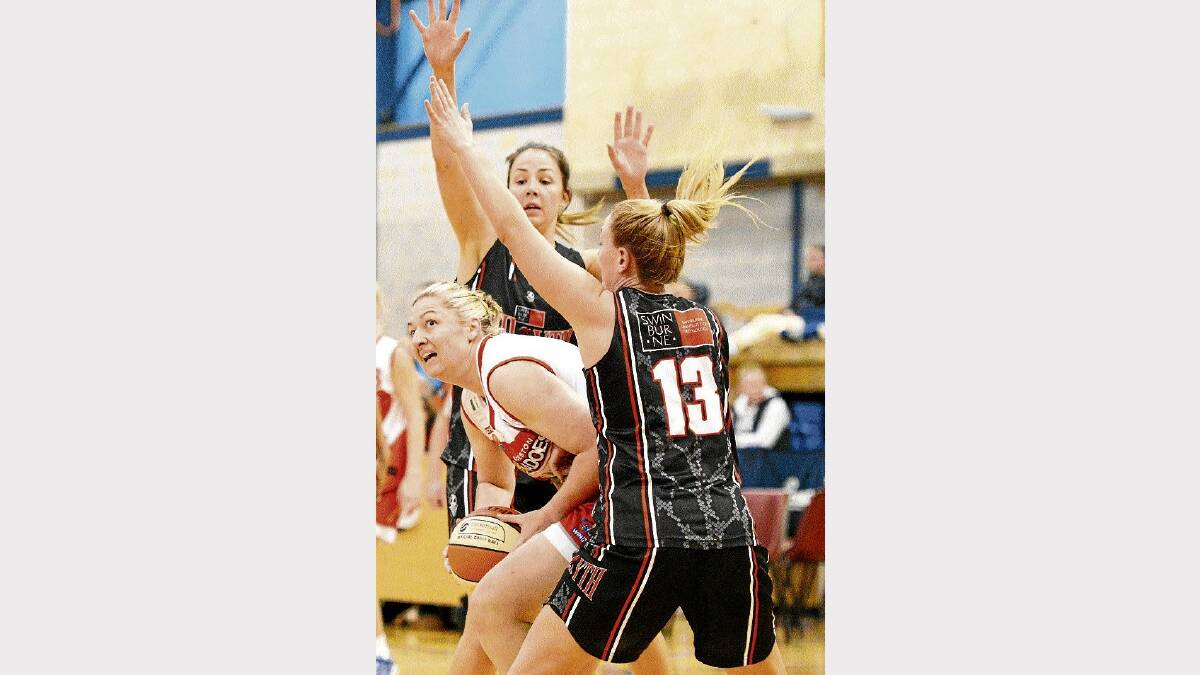 Launceston Tornadoes coach Peta Sinclair goes for the basket while filling in at the post this season. Picture: SCOTT GELSTON