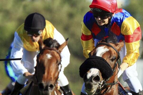 Kathy O'Hara (right) leads Ofcourseican to a win in Saturday's Coolmore Classic at Rosehill.