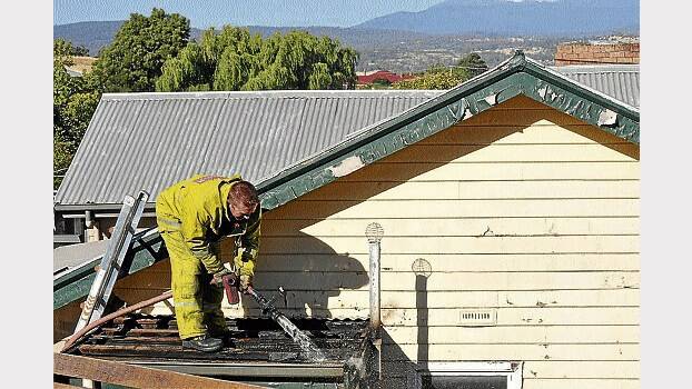 Firefighters were quick to control a South Launceston house fire yesterday afternoon. Picture: DANIEL McCULLOCH