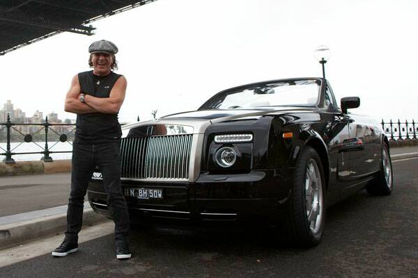 Top gear ... Brian Johnson in the Rolls-Royce Drophead Coupe, which he drove for a film of his travels.