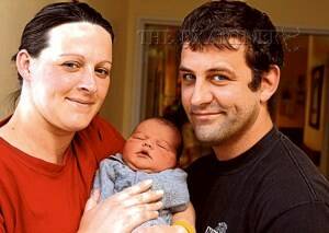 Rachel and Leigh Barber, of Perth, with baby Owen Michael. Picture: GEOFF ROBSON