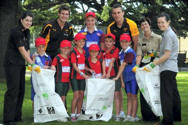  Hawks Grant Birchall and Clinton Young with Samantha Chilcott, of McDonald's, Riverside Little athletes Caleb Beament, Alissia Pearson and Gabi Beament, South Launceston Little athletes Charlotte Roney, Olivia Roney, Max Roney and Liam Markham, and  Teresa Fialho and Olivia French, both of McDonald's.  