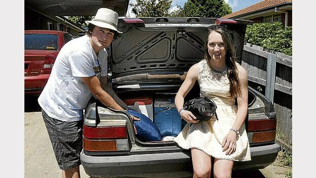 Packing for the Falls Festival are Clynton Brown, 23, of Legana, and Steph Ranson, 22, of Riverside. Picture: PAUL SCAMBLER