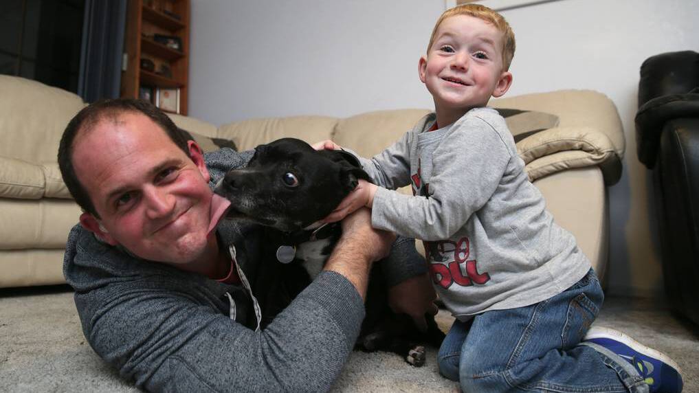 Bart Redpath and his son Angus Redpath are reunited with their family pet Spike, who has been returned after being stolen three years ago.