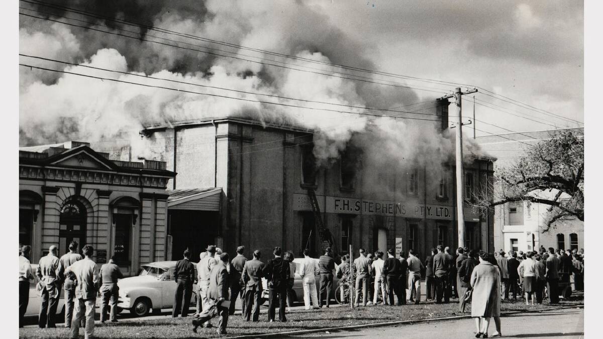 Fire at the F.H Stephens building, on the corner of St John and Cimitiere streets, Launceston. May 22, 1963.