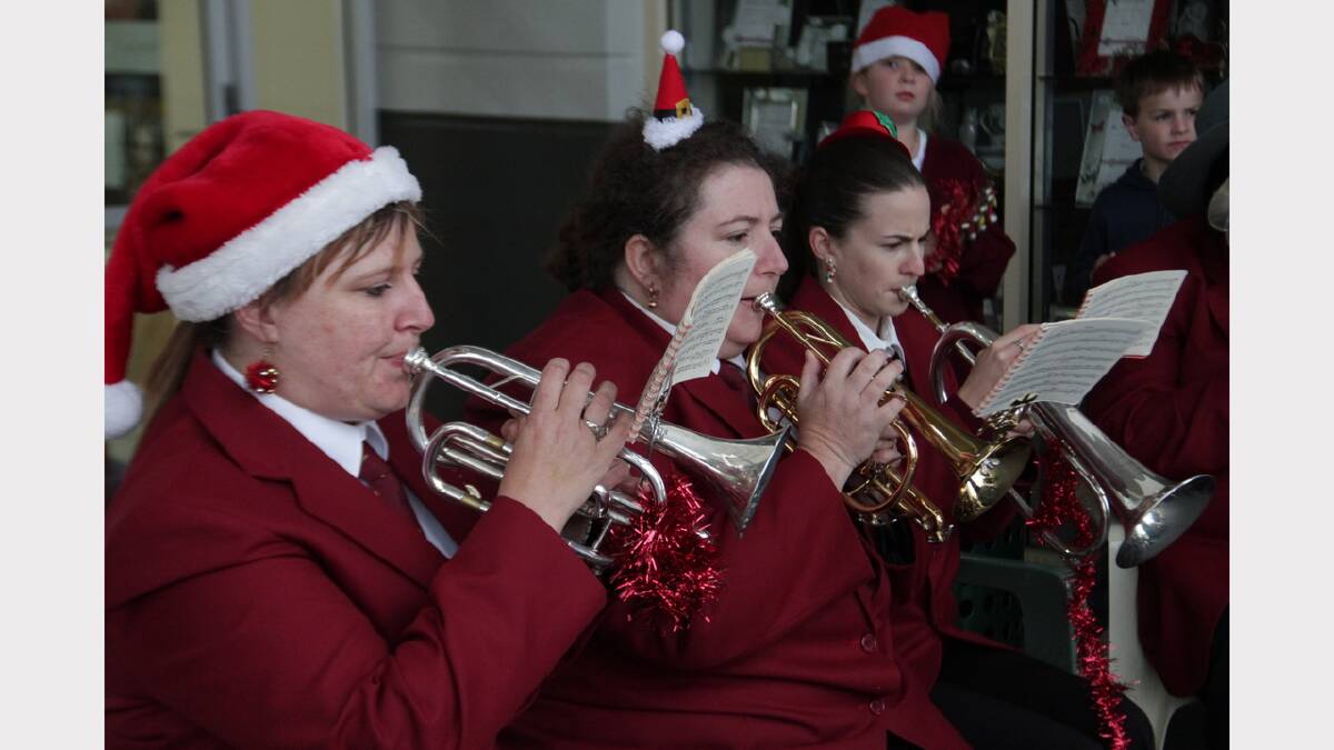 Railway Silver Band members Kristy Howard, Sonja Hindrum and Ashlea Edwards get into the spirit of Christmas.