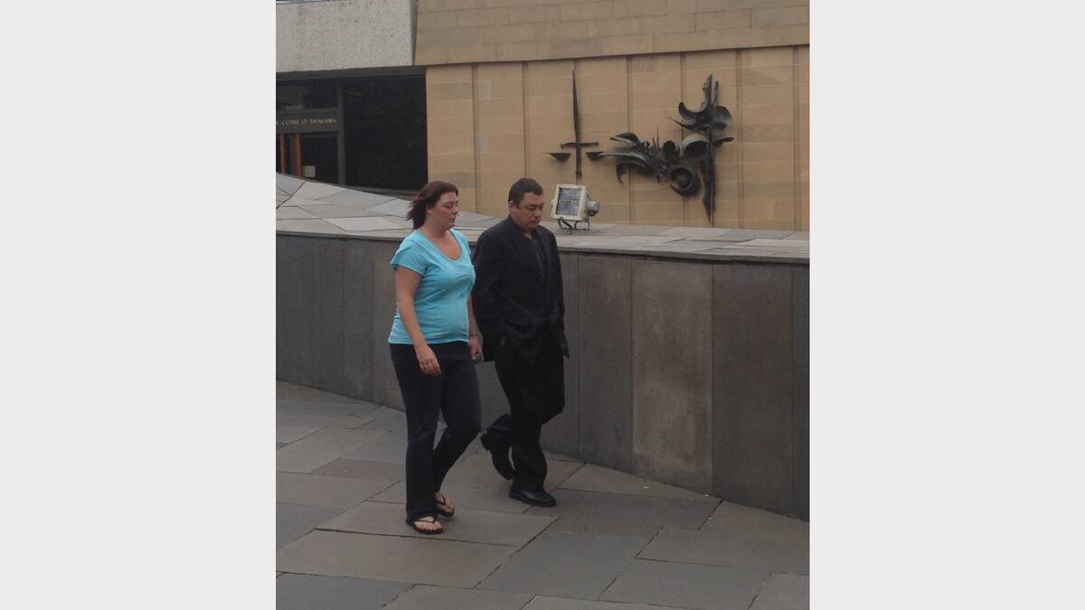 Jamie Peter Smart, right, walks away from the Hobart Supreme Court as a free man. Picture: Georgie Burgess
