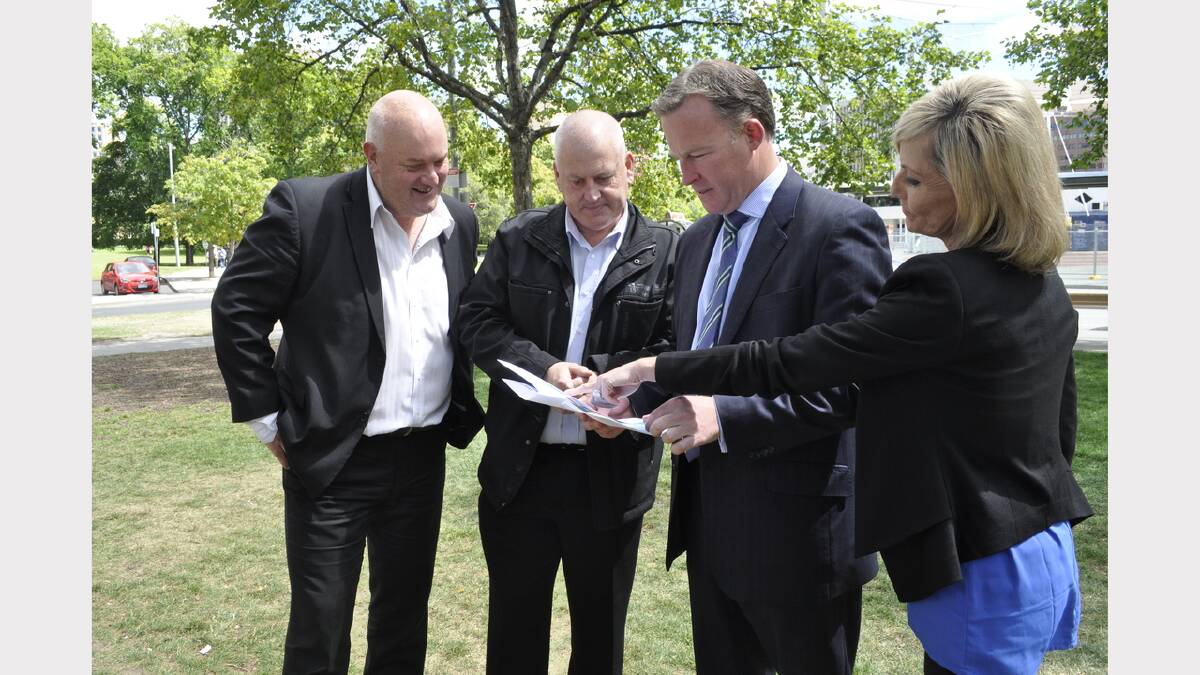   Tasmanian Hospitality Association chief executive Steve Old, Police Association president Pat Allen, Opposition Leader Will Hodgman and opposition police spokeswoman Elise Archer discuss the opposition's plan to reinstate the Public Order Response Team. Picture: Calla Wahlquist