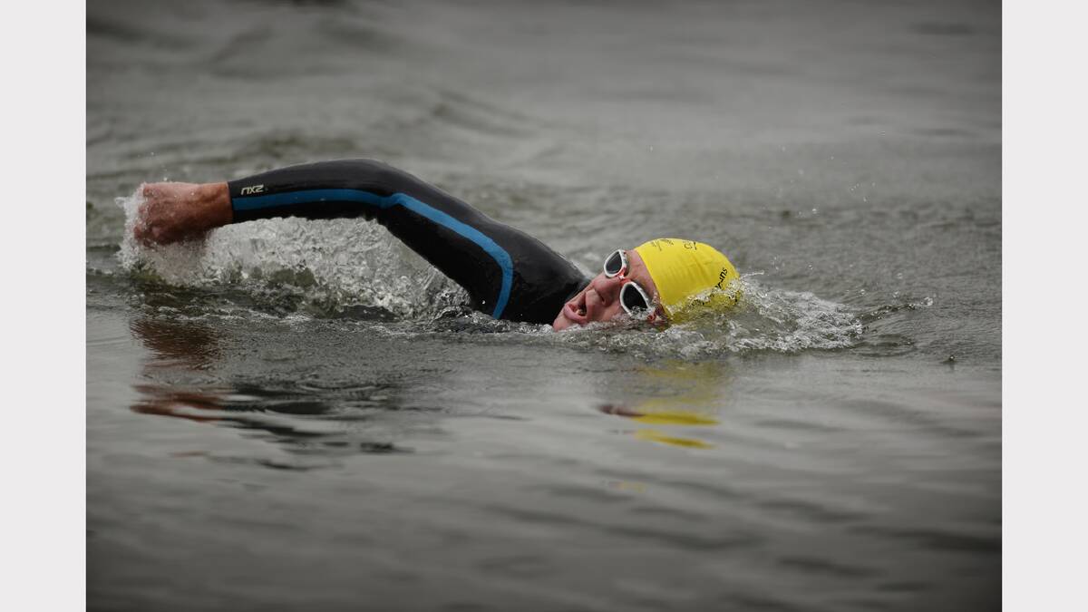 Shad Hearn makes his way through the novice swim leg in yesterday's triathlon at Trevallyn. Picture: Scott Gelston