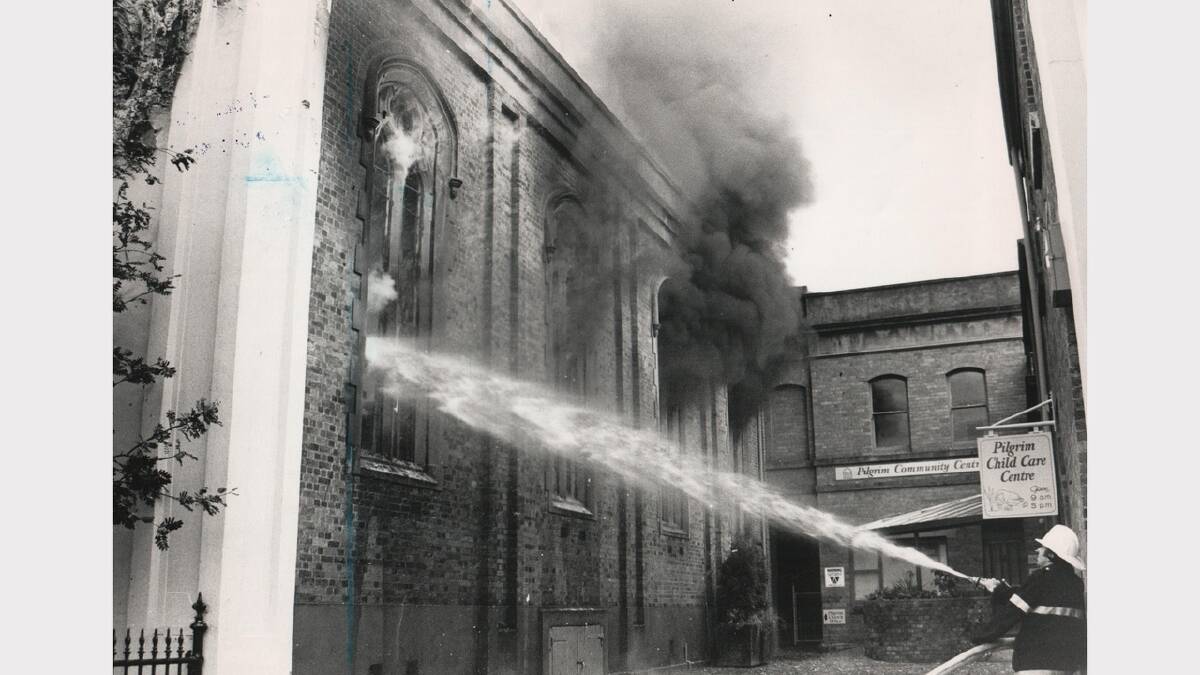 Firemen work to extinguish a fire at Pilgrim Hall. Alas, it was gutted. December 8, 1985.