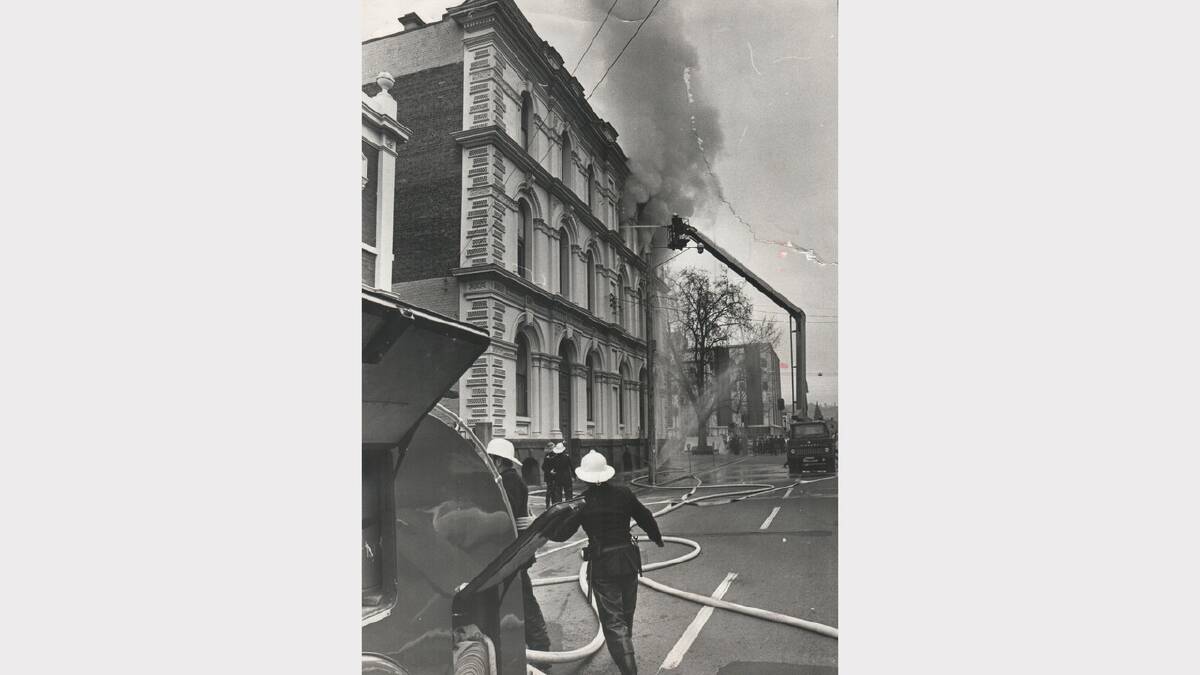 Fire destroyed the top level of Anax Pty Ltd, opposite the Launceston post office in Cameron Street. August 20, 1975.