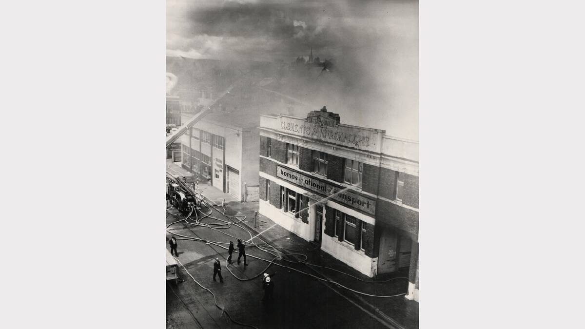 Fire at the Thomas National Transport building in Cimitiere Street, Launceston. The building was burnt out ad its contents destroyed. December 3, 1969.