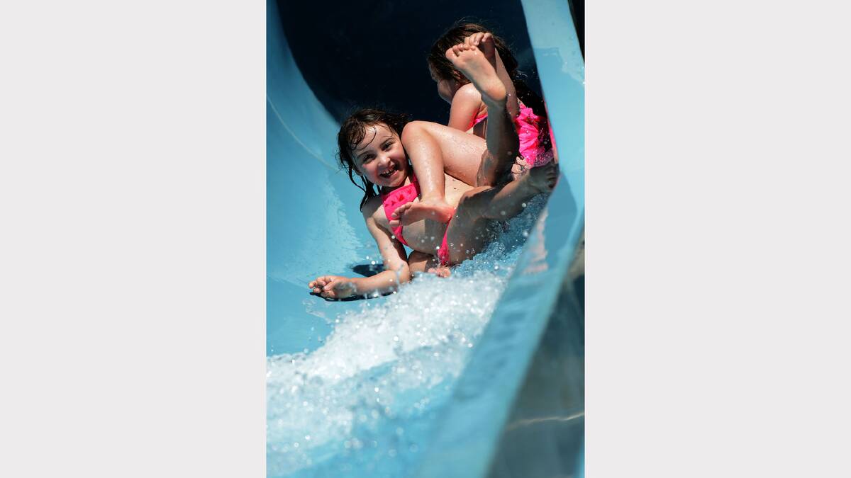 Zoe and Deliah Hunt, of Hobart, try out the water slide at Launceston Aquatic Centre. Picture: Scott Gelston