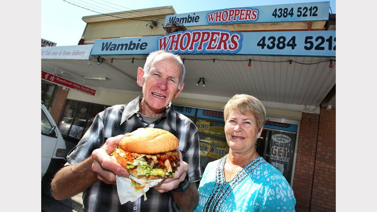 Creators of the Wambie Whopper Kevin and Maree Dean outside the Wamberal take-away shop. Picture: Phil Hearne