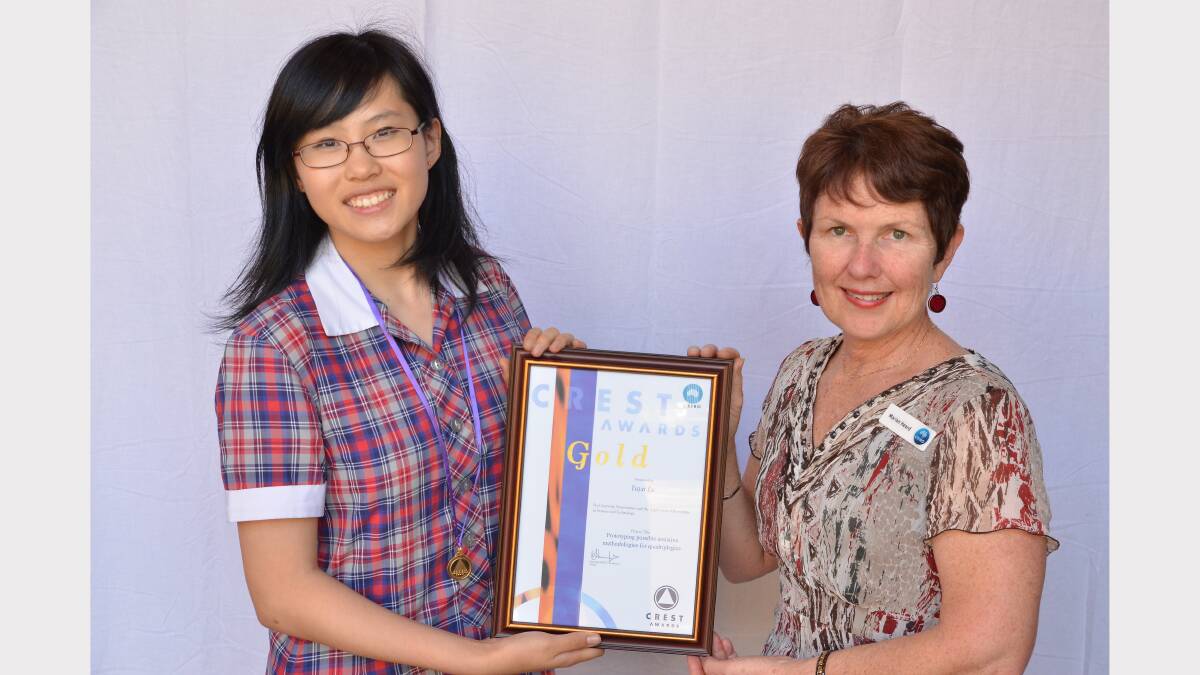 Engineers Australia (Tasmanian Division) Prizes. Yaya Lu, of Ogilvie High School, and Ms Marian Heard, of CSIRO Education.