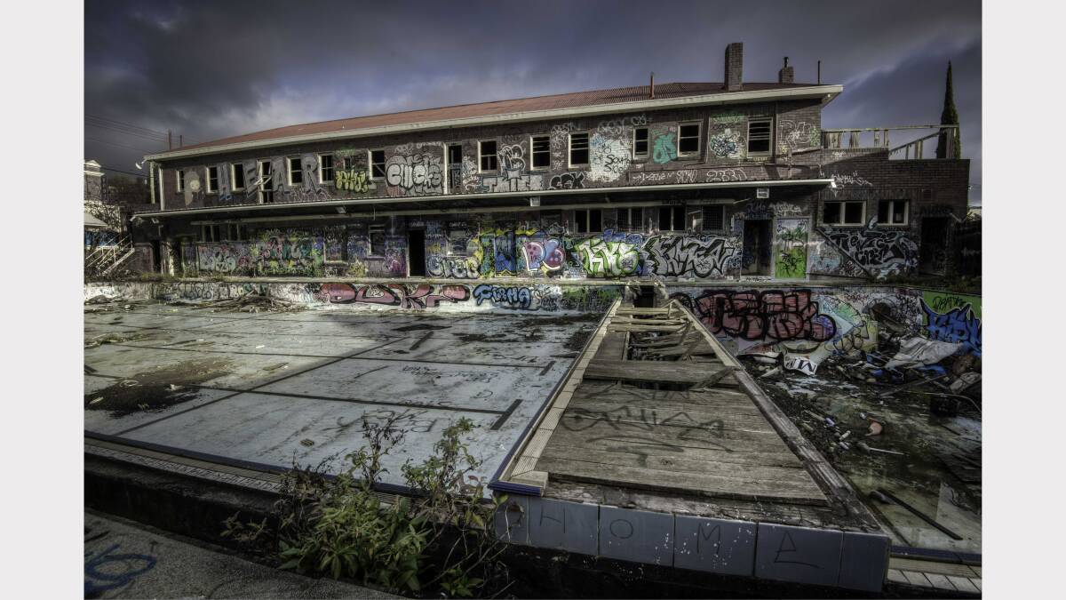 Graffiti brightens the old Tepid Baths, Hobart. Picture: Urbex Photography,