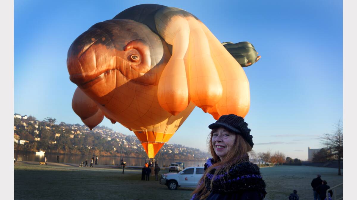 Raewyn Black, of Bridport, has a squiz at the Skywhale. Picture: Zona Black