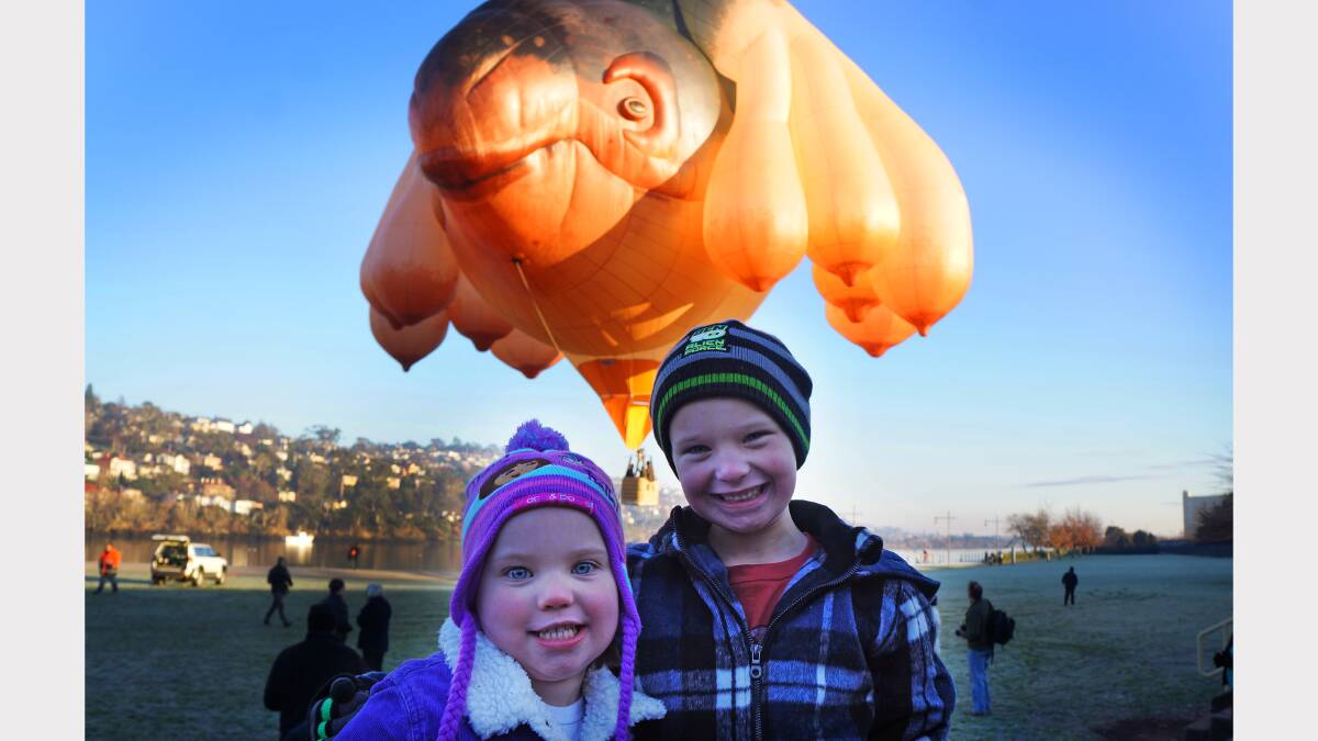 Skylah, 4, and Brodie, 6, Dolan, of Legana, visit the Skywhale in Launceston. Picture: Zona Black
