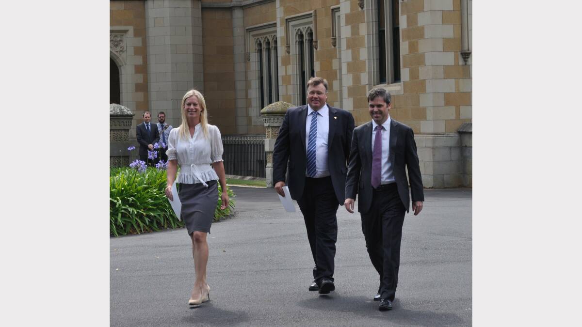 The two new Labor Ministers Rebecca White and Craig Farrell leave Government House with Attorney General Brian Wightman who has also taken on the Education and Skills portfolio. Picture: Georgie Burgess.  
