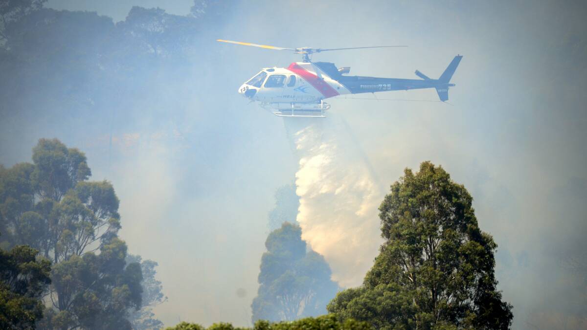 Seven crews battled to contain a vegetation fire near Mayfield.