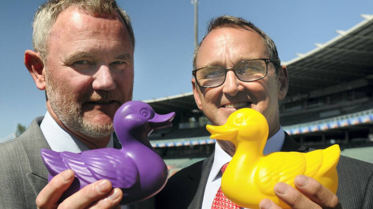 Launceston Mayor Albert van Zetten and Rotary Club of Central Launceston's Stuart Cottrell with ducks for the annual drop. Picture: PAUL SCAMBLER