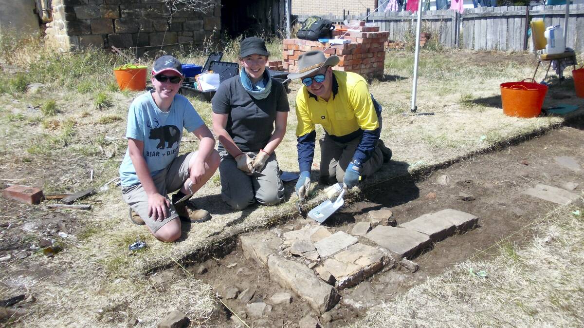 Excavating the remains of the 1828 Oatlands guard house are La Trobe University students Fiona Shanahan and Chris Silvester, under the supervision of archaeologist Sylvana Szydzik (centre), of Melbourne.