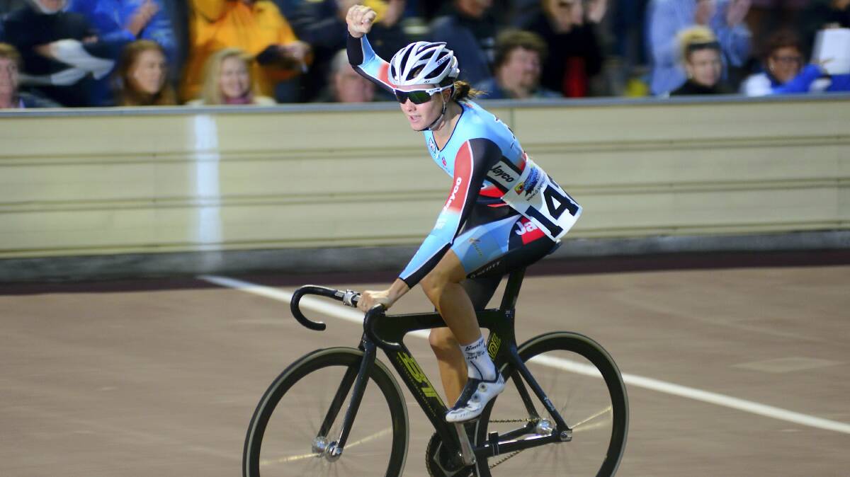 London Olympian and junior world champion Amy Cure celebrates her victory in last night's Devonport women's wheelrace. Pictures: PHILLIP BIGGS