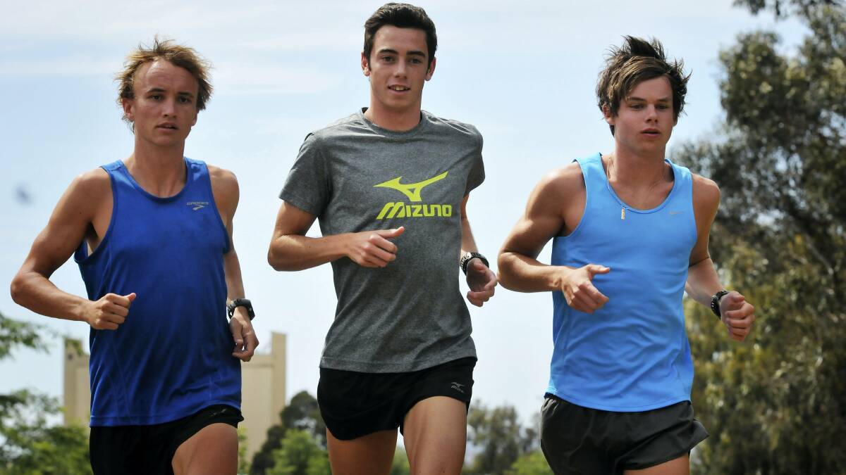 Runners Josh Harris, 22, Jacob Birtwhistle, 17, and James Hansen, 19, are off to Melbourne to compete in the national athletic series event this weekend. Picture: SCOTT GELSTON.
